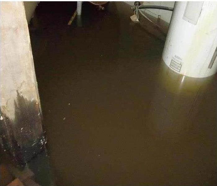 Sump pump with water around it